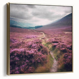 Framed landscape wall art depicting a serene countryside scene with rolling hills, vibrant greenery, and a sunset, accented by silver and gold tones for a modern touch. Perfect for home decor.