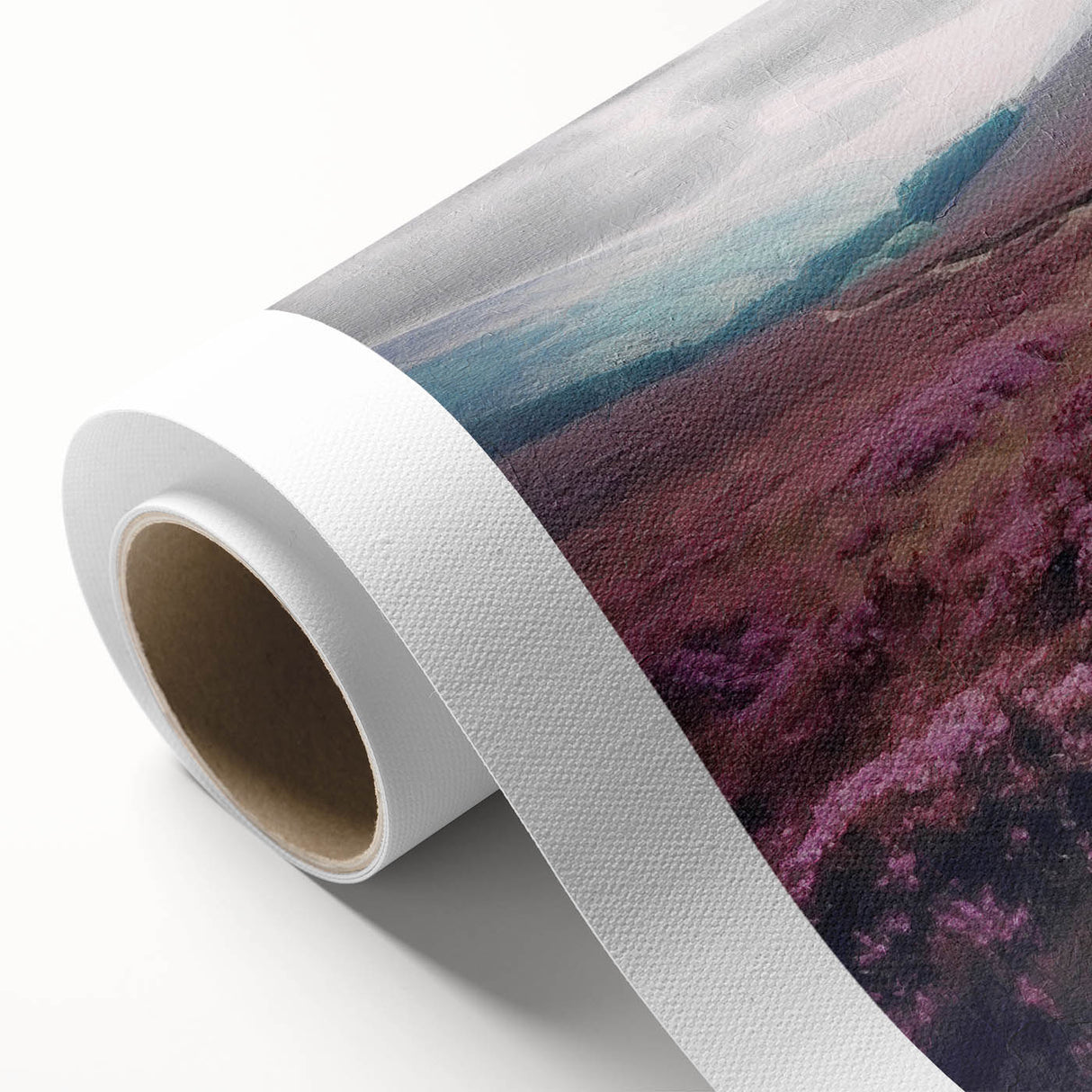 Landscape wall art on rolled canvas depicting a serene countryside scene with lush green fields and a clear blue sky, ideal for home decor.