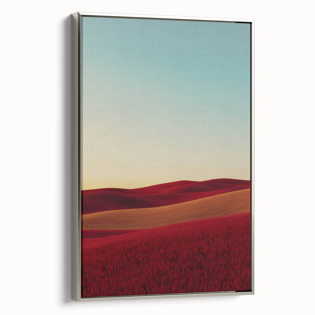 Framed canvas artwork depicting a serene countryside landscape, featuring lush green fields and a tranquil sky, elegantly bordered with a silver frame. Perfect for home decor.