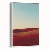 Framed canvas art displaying a serene countryside landscape with lush greenery and rolling hills, set against a white frame, ideal for home decor.