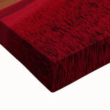 Close-up of a stretched canvas artwork depicting a serene countryside landscape with vibrant green fields and rolling hills, perfect for home decor.