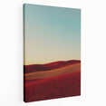 Stretched canvas artwork showcasing a serene countryside landscape with vibrant green fields and a clear blue sky, perfect for home decor or art enthusiasts.
