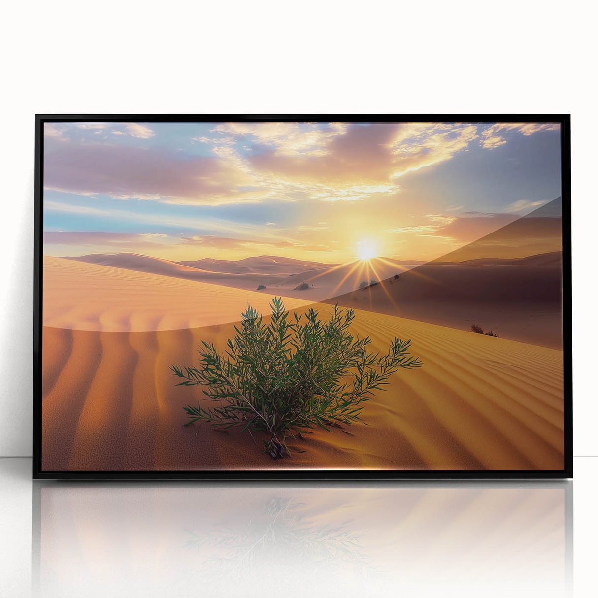 Framed acrylic wall art showcasing a vibrant desert landscape with warm tones of orange and red, set in a sleek black frame, perfect for modern home decor.