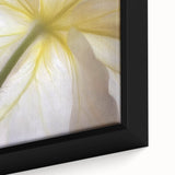 Close-up of textured black wall art featuring colorful floral designs on a framed canvas, ideal for living room decor.