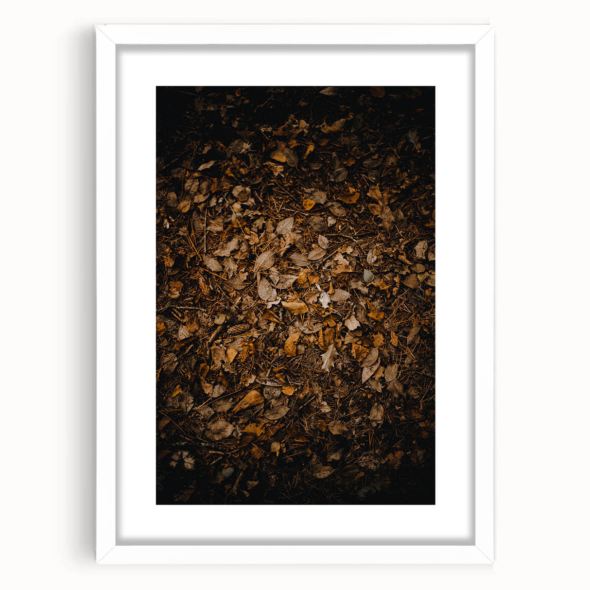 Abstract art print depicting autumnal trees in orange and red tones, framed in white, ideal for dining room decor.