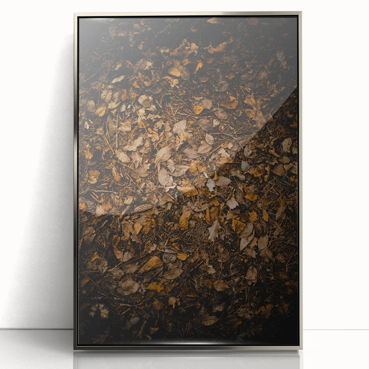 Mid-century modernist art depicting autumn trees in orange and brown tones on a silver-framed acrylic print.