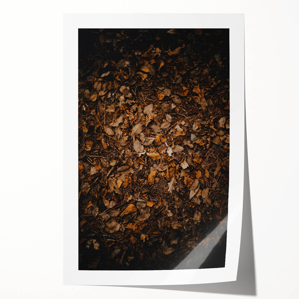 Rolled canvas print featuring an autumnal floral design in warm orange and red tones.