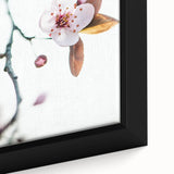 Close-up of a textured, black wall art canvas featuring colorful, abstract spring motifs, ideal for living room decor.