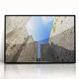 Framed acrylic artwork depicting a picturesque landscape with a majestic castle, presented in a sleek black frame, ideal for enhancing home decor aesthetics.