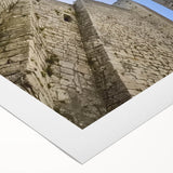 Rolled canvas print showcasing a vibrant landscape featuring an enchanting castle on a hill, perfect for home décor. Ideal for art lovers seeking unique wall art.