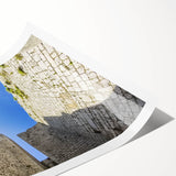 Rolled landscape print showcasing a stunning castle scene with vibrant colors and intricate details, elegantly packaged in a protective cardboard tube for shipping. Ideal for home decor enthusiasts seeking a touch of medieval charm.