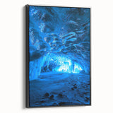 Framed canvas artwork depicting a stunning landscape with intricate cave designs, showcased in a sleek black frame, perfect for modern home decor.