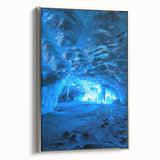 Framed canvas artwork depicting a serene landscape with caves, elegantly presented with a silver frame, ideal for enhancing modern home decor.