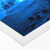 Rolled canvas artwork displaying a stunning landscape scene of vibrant caves, showcasing rich colors and intricate details, designed for home decoration.