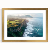 Elegant gold-framed landscape artwork featuring dramatic cliffs, set against a serene sky. Ideal for home decor or office aesthetics, enhancing any space with its vibrant colors and captivating scenery.