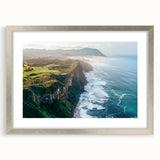 Framed landscape artwork depicting dramatic cliffs in vibrant colors, set in a sleek silver mat for an elegant presentation, perfect for home decor enhancement.