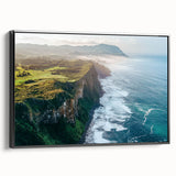 Framed canvas artwork depicting a dramatic landscape scene of cliffs against a serene sky, featuring a sleek black frame that enhances the visual appeal, ideal for modern home decor.