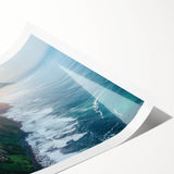 Stunning landscape print showcasing dramatic cliffs under a vibrant sunset sky, rolled for easy transport and framed display, ideal for home decor enthusiasts.