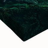 Close-up of a vibrant landscape canvas featuring rugged cliffs and a dramatic sky, showcasing rich colors and intricate details, perfect for home decor.