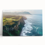 Stretched canvas artwork depicting striking cliffs under a vibrant sunset, showcasing rich colors and dramatic landscapes, ideal for home decor or art enthusiasts.
