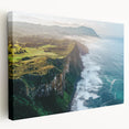 Stretched canvas artwork showcasing a stunning landscape of majestic cliffs under a vibrant sky, ideal for home decor and nature enthusiasts.