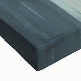 Close-up of an abstract architecture wall art design on stretched canvas, showcasing intricate geometric patterns in bold colors and textures, perfect for modern decor.