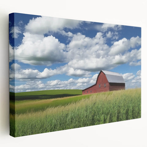 Stretched canvas artwork displaying a vibrant landscape scene of a rustic barn surrounded by lush greenery, perfect for home decor or art enthusiasts.