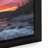 Close-up of a framed canvas artwork depicting a serene landscape bridge scene, showcasing vibrant colors and intricate details, ideal for home decor.