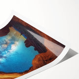 Vibrant landscape rolled print showcasing majestic canyons in rich earth tones, elegantly packaged in a protective cardboard tube, perfect for home decor.