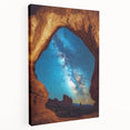 Stretched canvas artwork depicting a vibrant landscape of canyons in warm earth tones, showcasing dramatic rock formations and a serene sky, perfect for home decor.