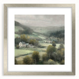Framed landscape countryside wall art featuring vibrant green fields and a tranquil sky, elegantly displayed with a silver mat border for a modern touch.