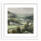 Framed landscape wall art depicting a serene countryside scene with rolling hills and a clear blue sky, featuring a white mat for an elegant finish.