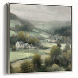 Framed canvas wall art depicting a serene countryside landscape, featuring lush green fields and a vibrant sunset, accented with a sleek silver frame.
