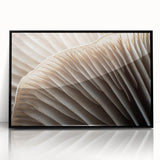 Large abstract wall art featuring close-up floral designs in vibrant colors, framed in black acrylic.