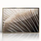 Large art print of close-up floral imagery in soft pastel shades on a framed acrylic, ideal for modern nursery decor.