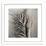 Abstract art print featuring close-up nature elements in muted green and brown tones, white framed.