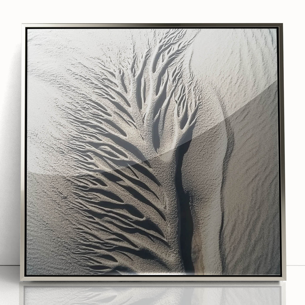 Mid-century modernist art depicting nature elements in muted green and brown tones, framed in silver acrylic.
