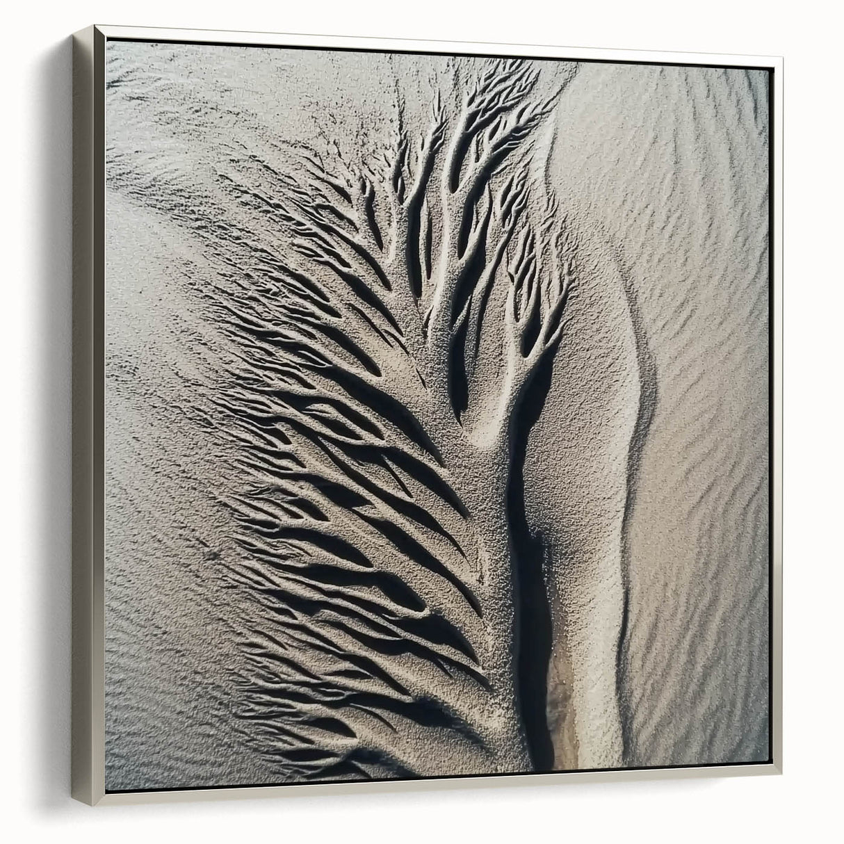 Framed canvas featuring a vintage landscape painting with colorful flora against a black background.