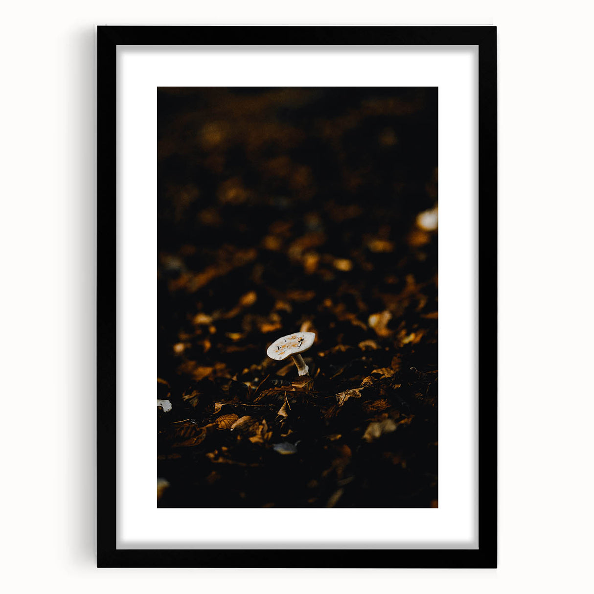 Abstract art print featuring vibrant autumnal colors on a textured canvas, framed in black, ideal for living room decor.