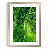 Textured abstract art print in pastel shades on a silver-framed canvas, ideal for bedroom wall decor.