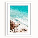 Abstract art print featuring swirling blue and white patterns on a framed canvas, ideal for bedroom or dining room decor.