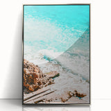 Mid-century modernist art featuring geometric shapes in muted pastels on a silver-framed acrylic.