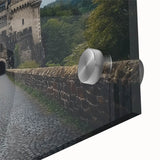 Close-up view of an acrylic glass landscape artwork depicting a majestic castle surrounded by lush greenery, showcasing vibrant colors and intricate details. This beautiful piece is ideal for enhancing home decor with a touch of elegance and grandeur.