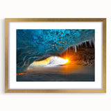Elegant gold-framed landscape print showcasing a serene cave scene with a textured mat, perfect for enhancing home decor and creating a tranquil ambiance.