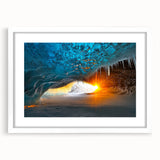 Framed landscape artwork depicting a serene cave scene, featuring earthy tones and a white mat, perfect for home decor or art enthusiasts. The design emphasizes natural beauty and tranquility, ideal for enhancing living spaces.