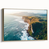 Framed canvas artwork showcasing a stunning landscape of cliffs with golden hues, presented from a side view, perfect for enhancing interior decor in modern spaces.