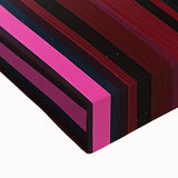 Close-up of an abstract geometric stretched canvas artwork showcasing vibrant colors and intricate patterns, perfect for modern home decor or art enthusiasts.