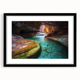 Elegant black-framed landscape artwork showcasing vibrant canyons with a mat for added contrast, perfect for enhancing modern home decor and wall aesthetics. This stunning piece embodies natural beauty and artistic flair, ideal for living spaces or office interiors.