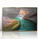 Framed acrylic art print showcasing a stunning landscape of canyons in gold tones, ideal for modern home decor. Perfect for nature lovers seeking elegant wall art.