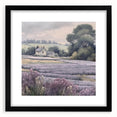 Framed landscape wall art depicting a serene countryside scene with vibrant greenery and a blue sky, featuring a sleek black frame and a white mat, perfect for home decor.